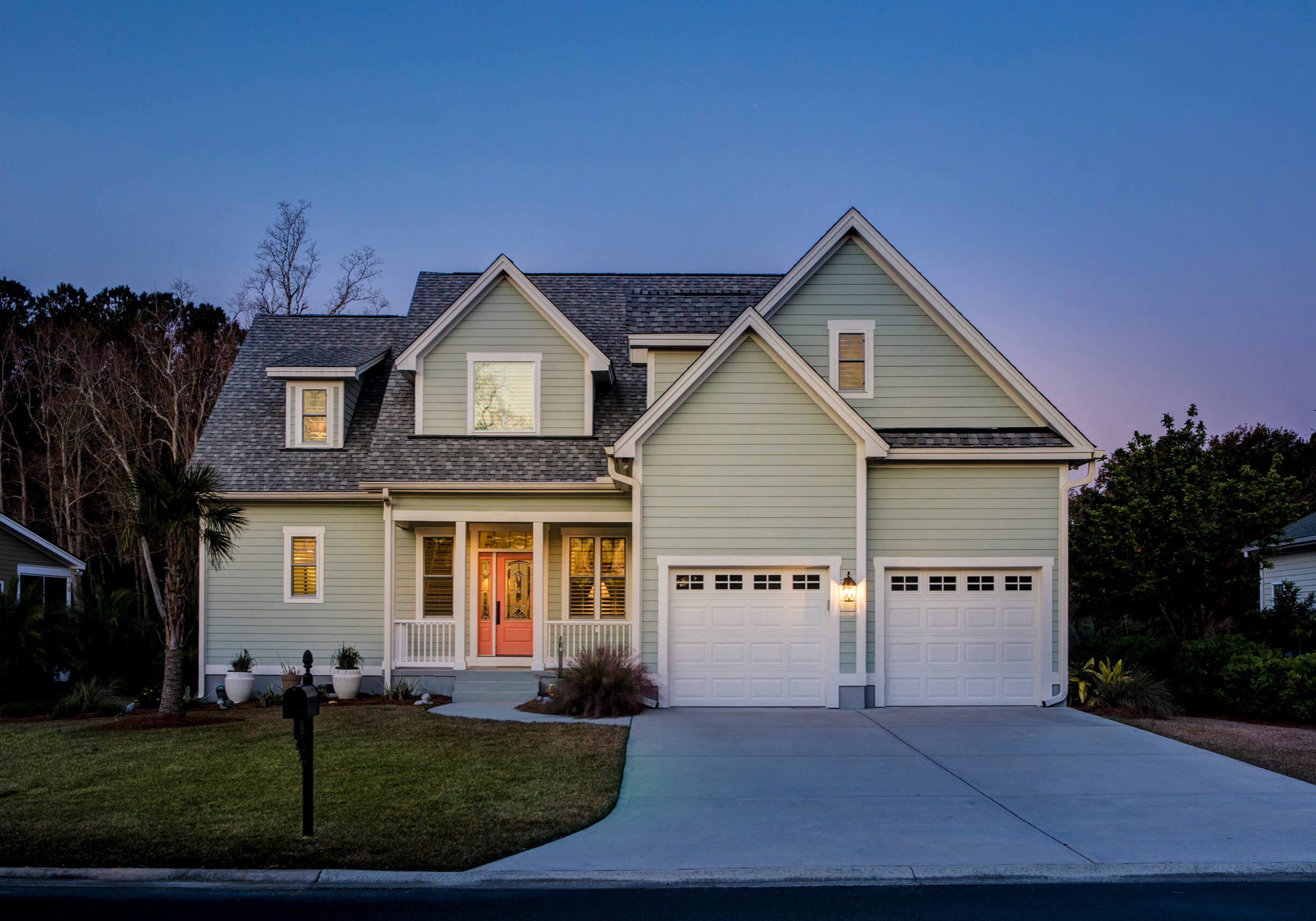 Local Painters in Mount Pleasant, TX: Beautiful light green house with white trim